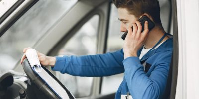 man-truck-guy-delivery-uniform-man-with-clipboard_1157-46191